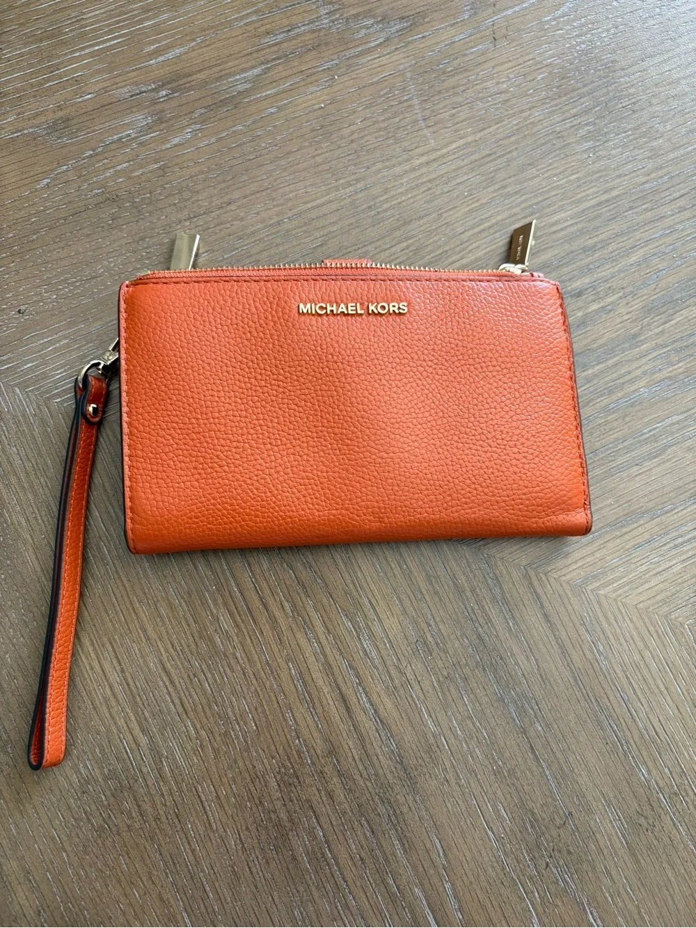 Michael Kors Orange Pebbled Leather Wristlet